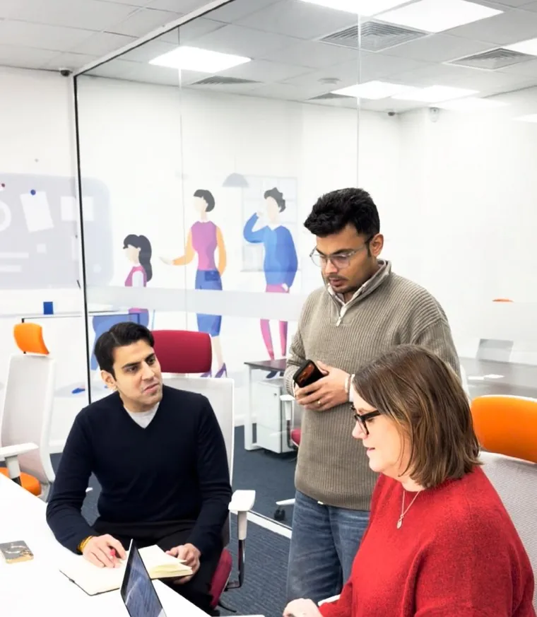 The account team working through a brand's weekly numbers